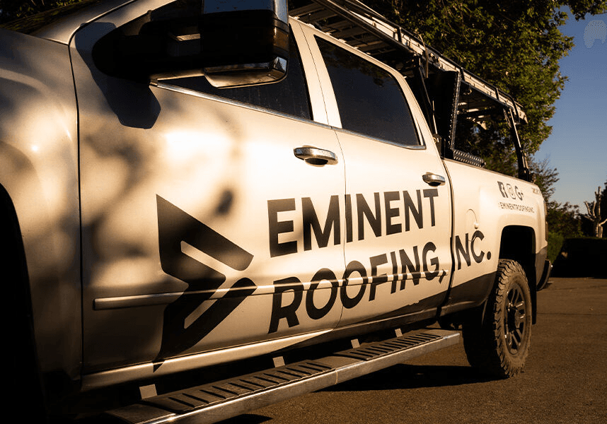 Eminent Roofing truck at a Tri-Cities job site near the Richland headquarters