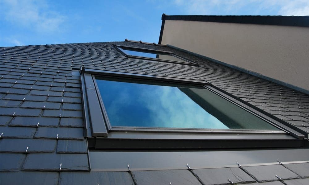Skylights installed on a shingled roof