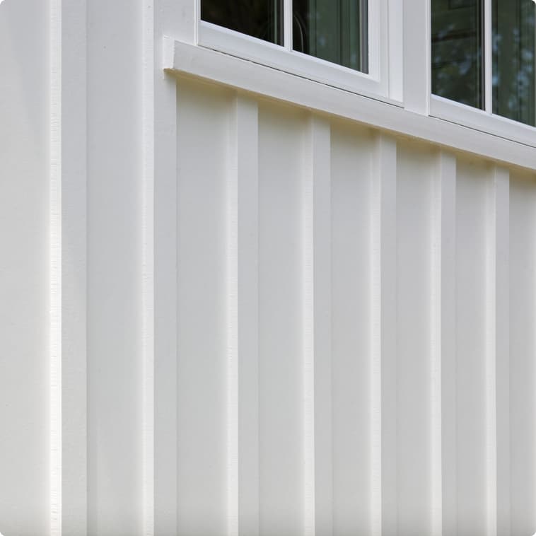 Hardie board and batten siding with white trim