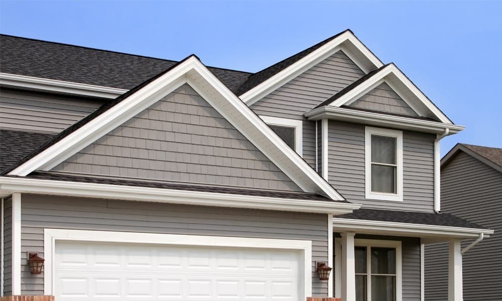 Lap and shake siding with white fascia on a Tri-Cities home