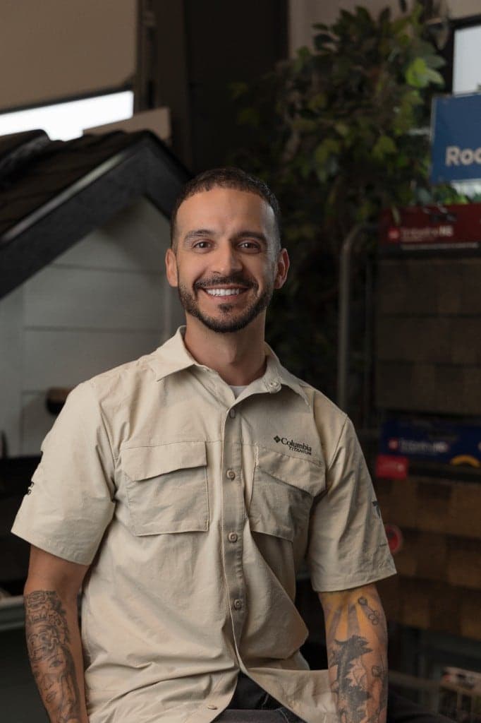 Alex Gomez, Safety Manager at Eminent Roofing, in the Richland showroom