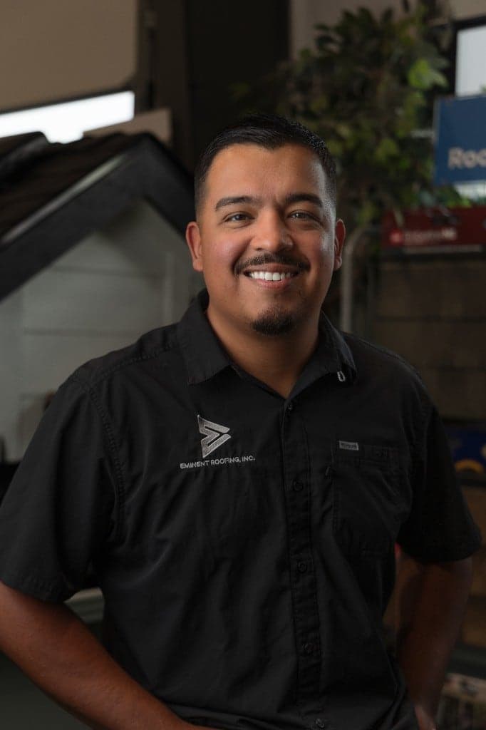 Hector Torres Jr., CEO of Eminent Roofing, in the Richland showroom